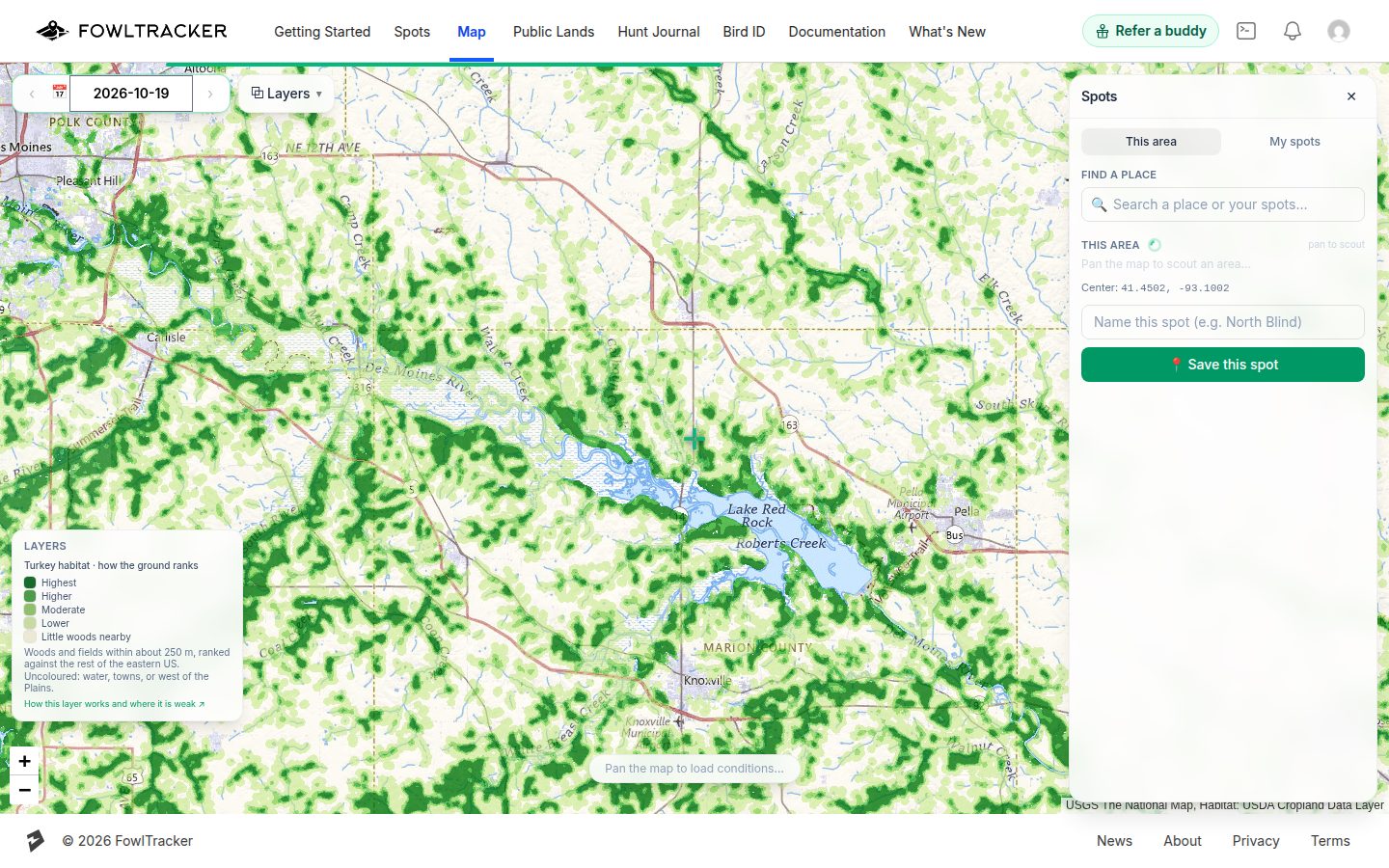 The turkey habitat layer over farm-and-woodlot country in Iowa: woods and river bottoms in green, open cropland uncoloured
